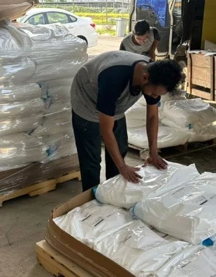 Water treatment materials prepared for supply